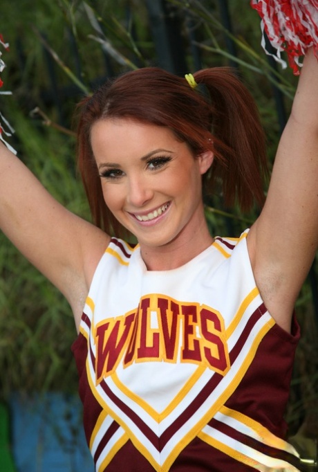 Redhead cheerleader Tweety Valentine gets banged and facialed by black bulls