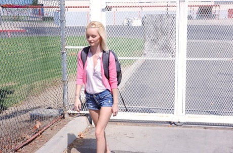 Blonde teen Sammie Daniels takes a nice walk after finishing her classes