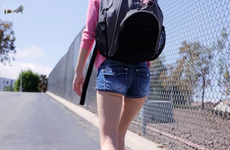 Blonde teen Sammie Daniels takes a nice walk after finishing her classes