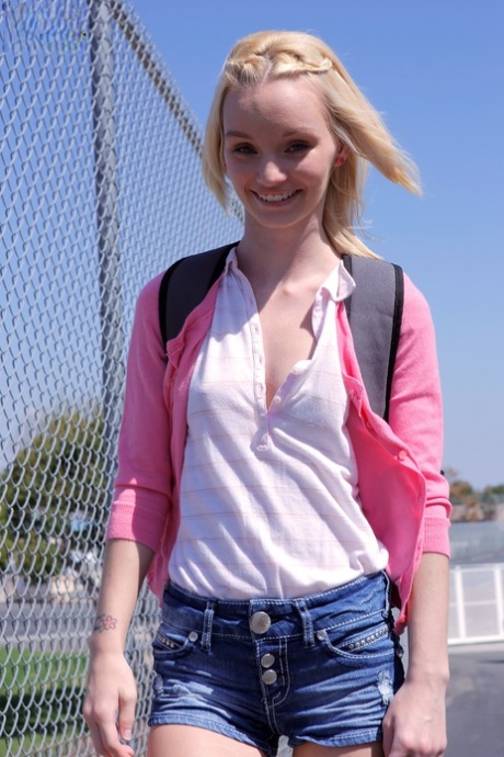 Blonde teen Sammie Daniels takes a nice walk after finishing her classes