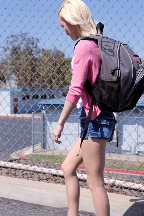 Blonde teen Sammie Daniels takes a nice walk after finishing her classes
