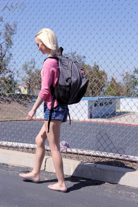 Blonde teen Sammie Daniels takes a nice walk after finishing her classes