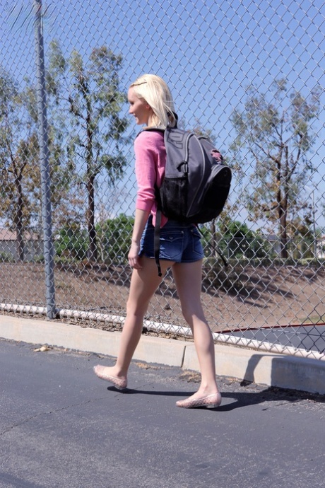 Blonde teen Sammie Daniels takes a nice walk after finishing her classes