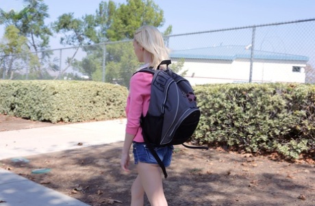Blonde teen Sammie Daniels takes a nice walk after finishing her classes