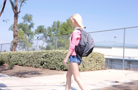 Blonde teen Sammie Daniels takes a nice walk after finishing her classes
