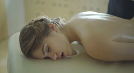Nude teen Karolin enjoys a sensual massage and a strong dick in her pussy