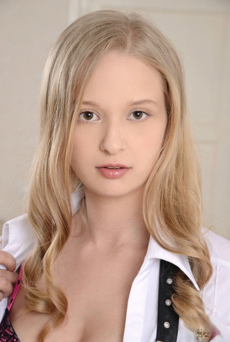 Beautiful petite teen Inga shows her sweet shaved pussy up close