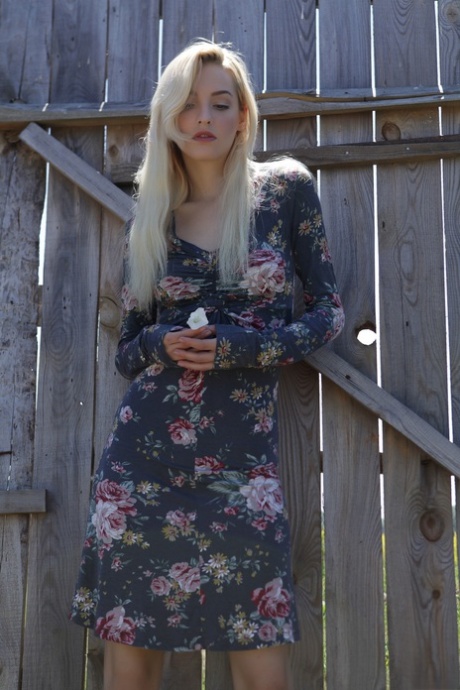 Blonde teen Kira W unveils her white tits & gets tangled up in ropes outdoors