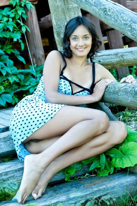 Exotic beauty Chandra A displaying her furry pussy and tiny tits in nature