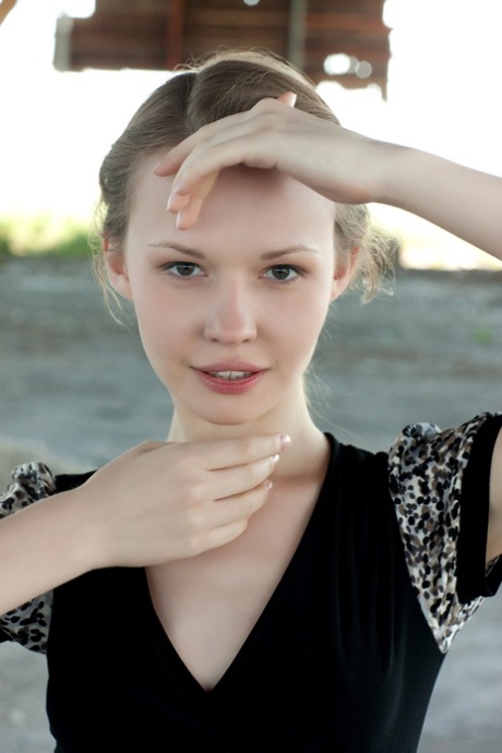 Russian teen Virginia Sun strips naked outdoors & reveals her slim body