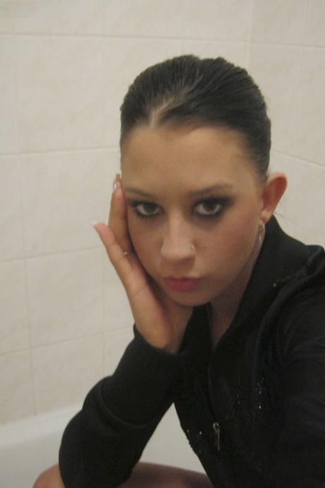 Czech teen Sarah Lollypop strips and shows her natural body in an amateur solo