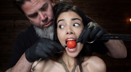 Brunette teen with small tits Harmony Wonder gets tied up & toyed by a device