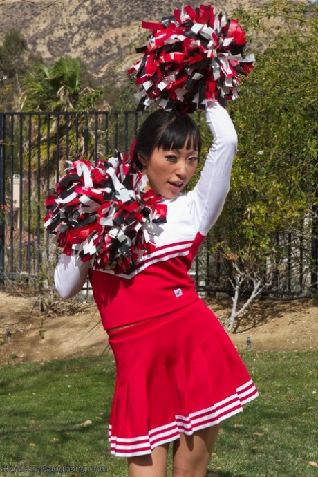 Asian cheerleader with big tits Gaia gets gangbanged by a group of strangers