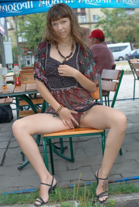 Glamorous babe Red Eva shamelessly touching her pussy in public