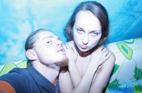 Shy teen Tanya shows her small tits while taking topless selfies with her BF