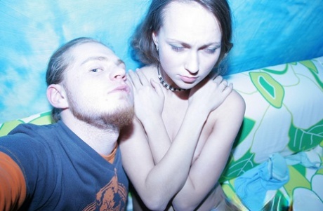 Shy teen Tanya shows her small tits while taking topless selfies with her BF