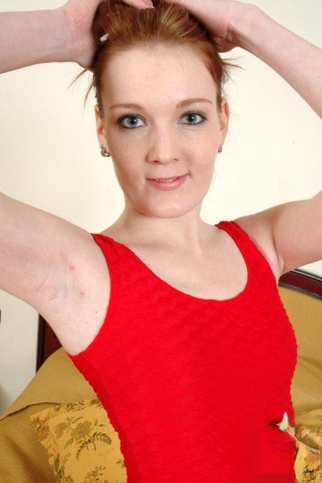 Cute ginger MaggieS reveals her pink holes and stockinged feet in a solo