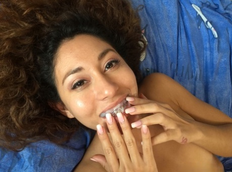 Curly-haired Latina Melody Petite gets her mouth filled with sticky cum