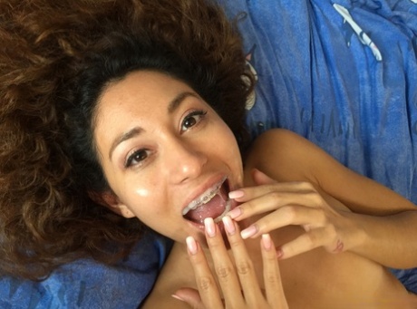 Curly-haired Latina Melody Petite gets her mouth filled with sticky cum