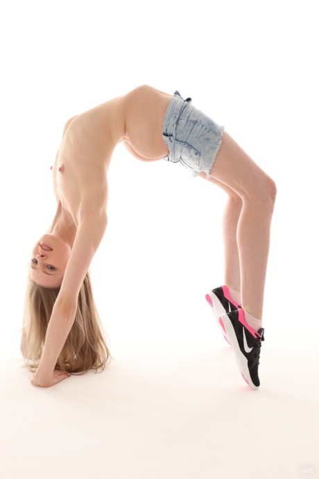 Beautiful flexible teen Elfia showing off her small tits & her sweet pink muff