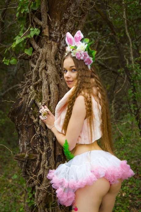 Cute brunette babe Milena Angel stuffs her twat with a carrot outdoors
