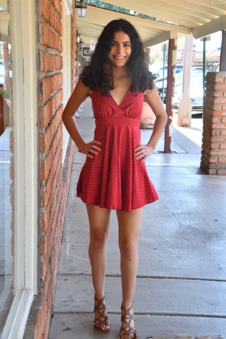 Charming babe Paola teases in a sexy dress & flashes a pantyless upskirt