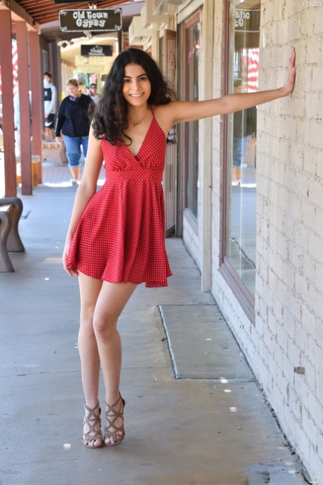 Charming babe Paola teases in a sexy dress & flashes a pantyless upskirt