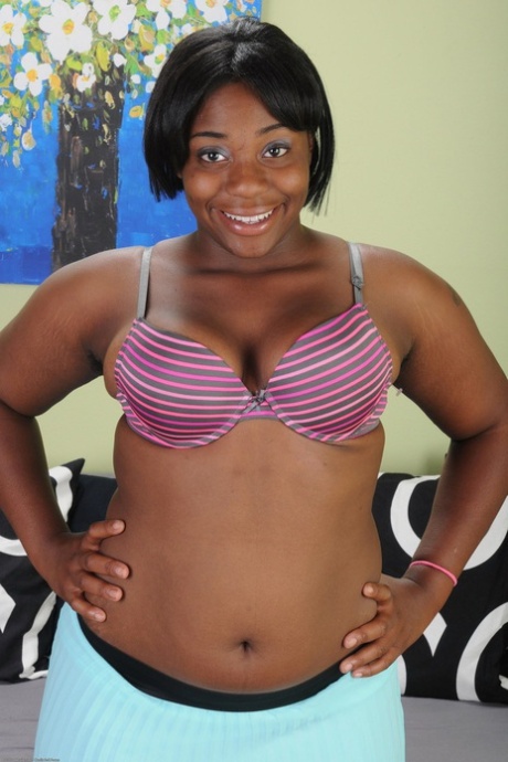 Thick ebony housewife Lacey shows her fat ass and furry pussy in a solo