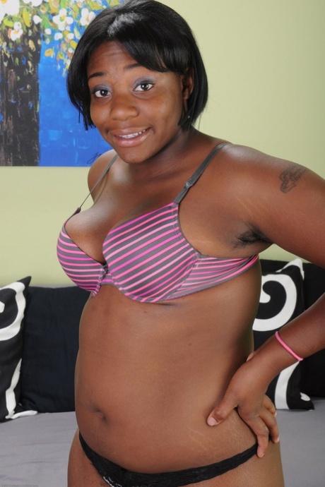 Thick ebony housewife Lacey shows her fat ass and furry pussy in a solo
