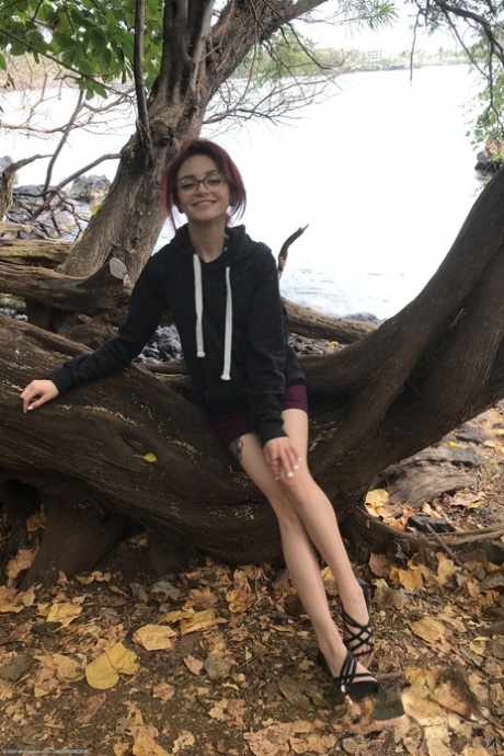 Petite redhead Lola Fae exposing her natural tits and her yummy pussy