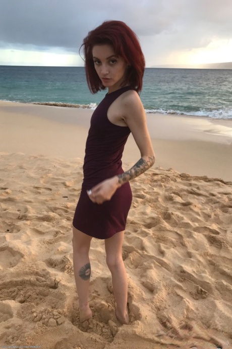 Petite redhead Lola Fae exposing her natural tits and her yummy pussy