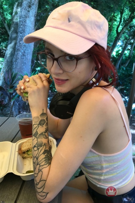 Petite redhead Lola Fae exposing her natural tits and her yummy pussy