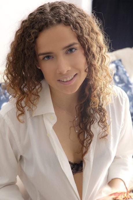 Curly haired hottie Carolina reveals her cunt and gets it stuffed deeply