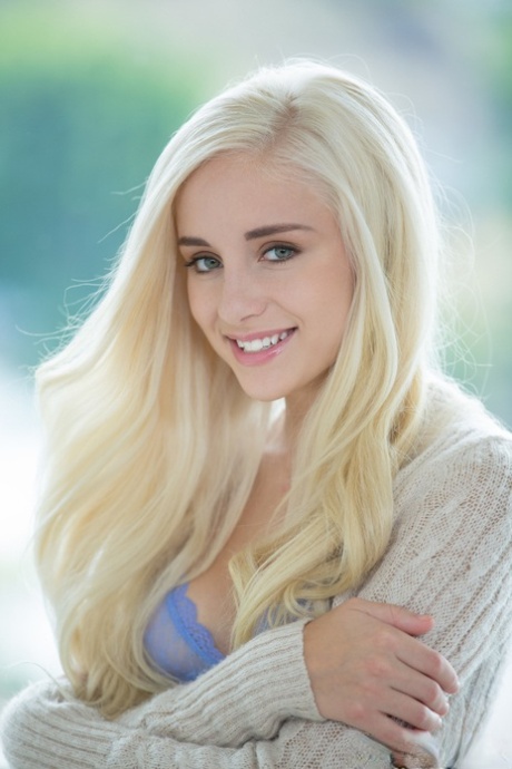 Blonde teen with small breasts Naomi Woods rides a black cock on a bed