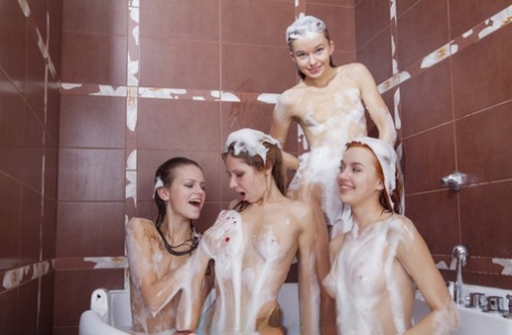 Hottie Milena Angel having a bubble bath with her lesbian girlfriends