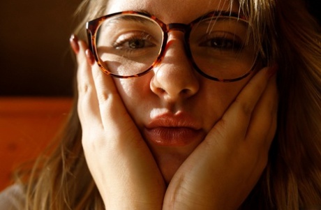 Amateur babe in glasses Olivia Yukon teases with her amazing ass in public