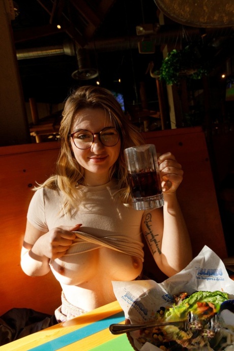 Amateur babe in glasses Olivia Yukon teases with her amazing ass in public