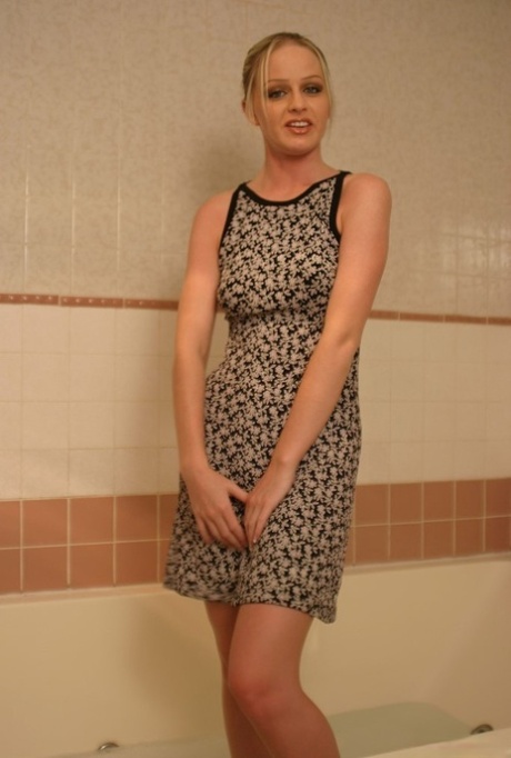 Teen Karlene teases with her incredible round ass & boobs in the bathroom