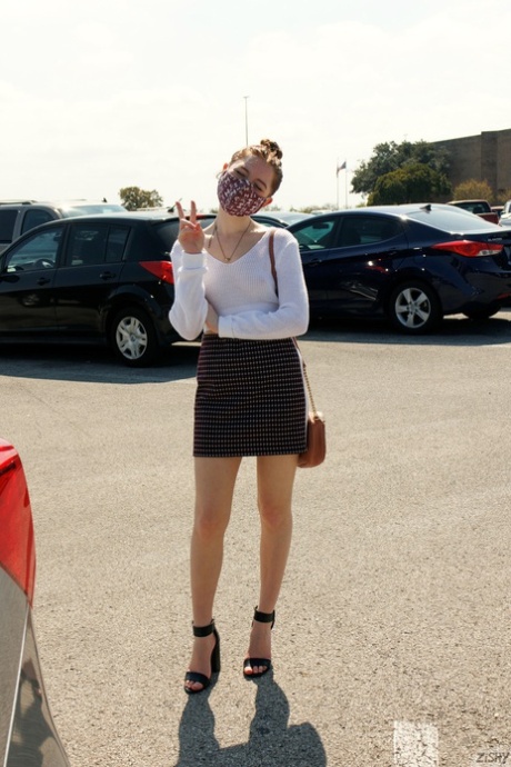 Sexy babe Myra Glasford flashes her ass and tits before stripping in a car