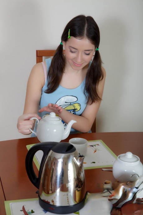 Sweet teen with pigtails Grace Young gets her twat filled on the table