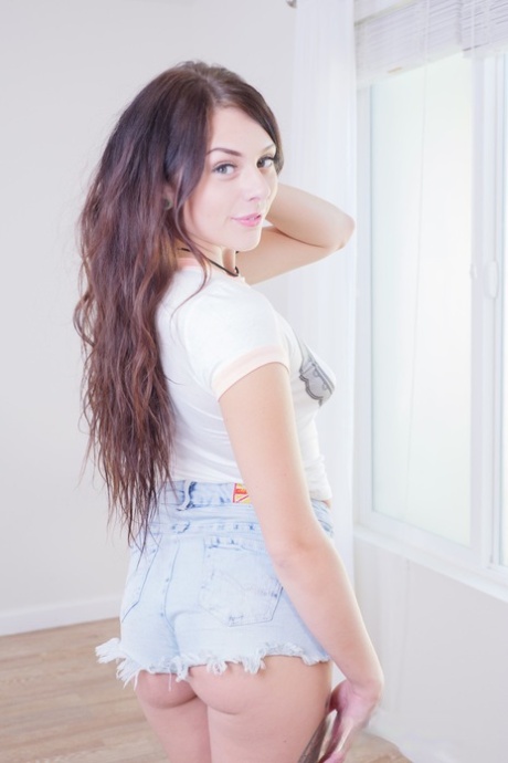 Hot babe in booty shorts Megan Sage strips & spreads her yummy pink pussy