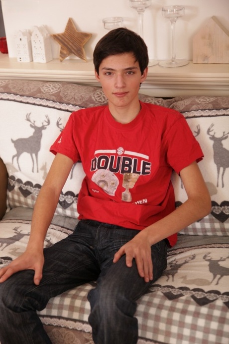 Skinny twink Jake Vosnik strips naked while playing with his hard dick