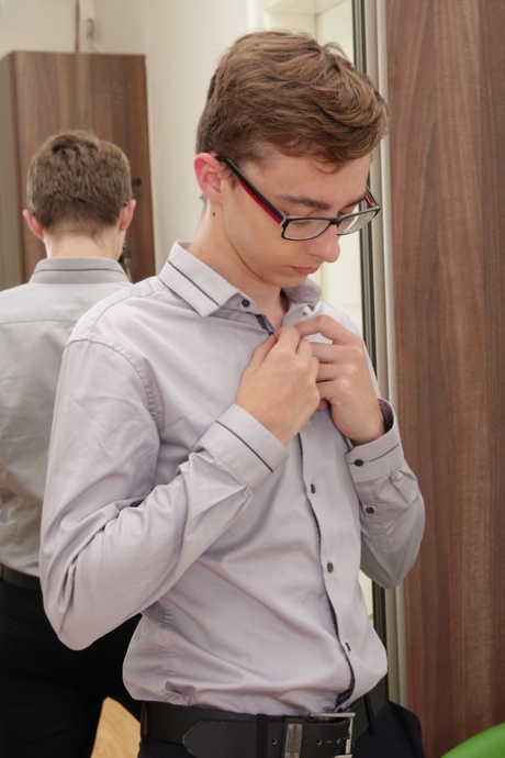 Gay nerd Jack Flynn stripping and stroking his big dick in the mirror