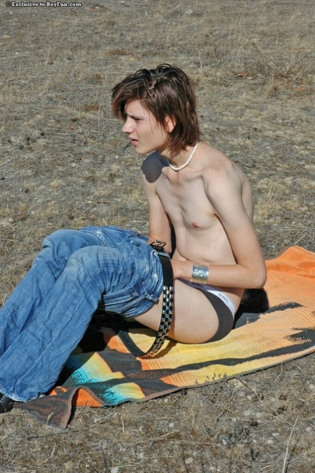 Skinny twink Trent 3 strips naked  shows his erect dick up close outdoors