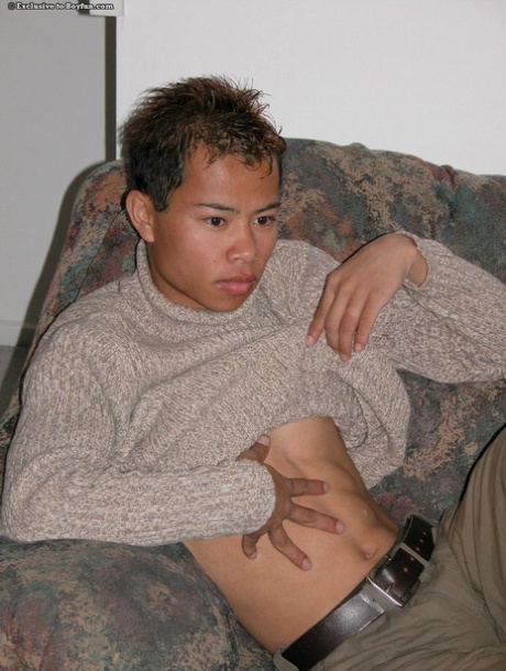 Asian gay hottie Sam strips naked before massaging his uncut dick & big ass
