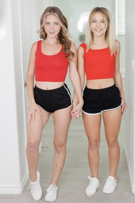 Blondes Emma Bug and Macy Meadows show off their big asses in their panties