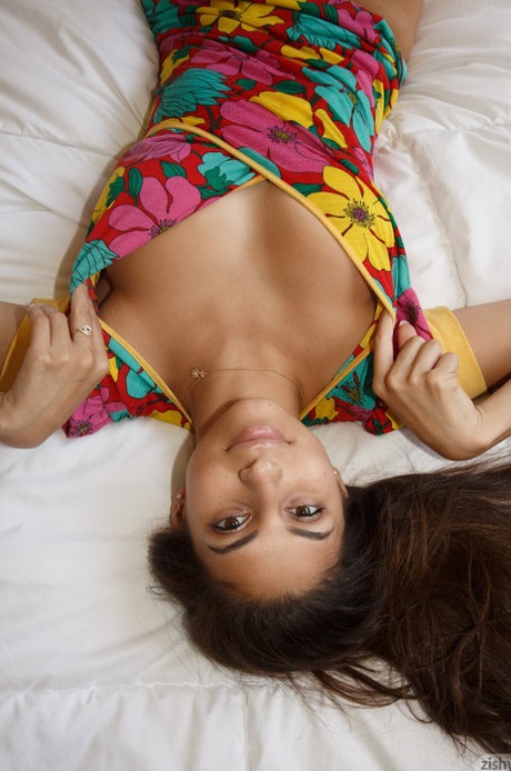 Cute teen girlfriend Nina North flaunts beautiful tits and poses on the bed