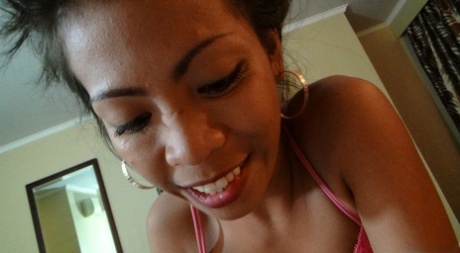 Asian teen April Noriega doffs her plaid skirt & gives a hot POV blowjob