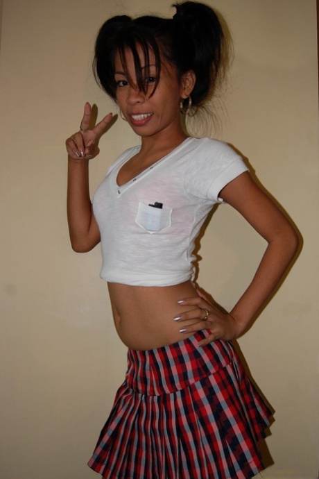Asian teen April Noriega doffs her plaid skirt & gives a hot POV blowjob