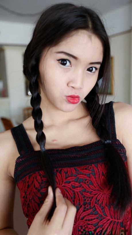 Beautiful petite Asian babes show off their wonderful teen tits